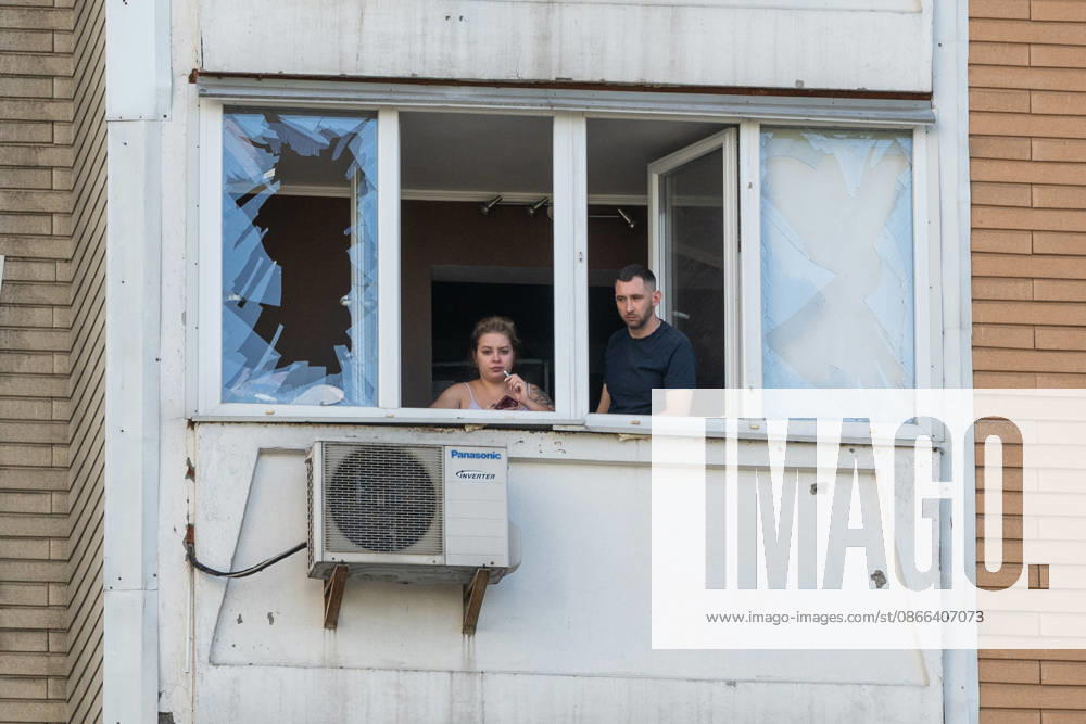 A man and a woman look out from a balcony in a 24-storey apartment block damaged by a Russian attack in the Darnytskyi district of Kyiv, Ukraine, September 9, 2026. On Wednesday morning, September 9, a Russian drone hit the 24-storey building on the 12th floor. According to police, five people were injured, including a pregnant woman. (Photo by Danylo Antoniuk Ukrinform) Apartment block hit by Russian drone in Kyiv