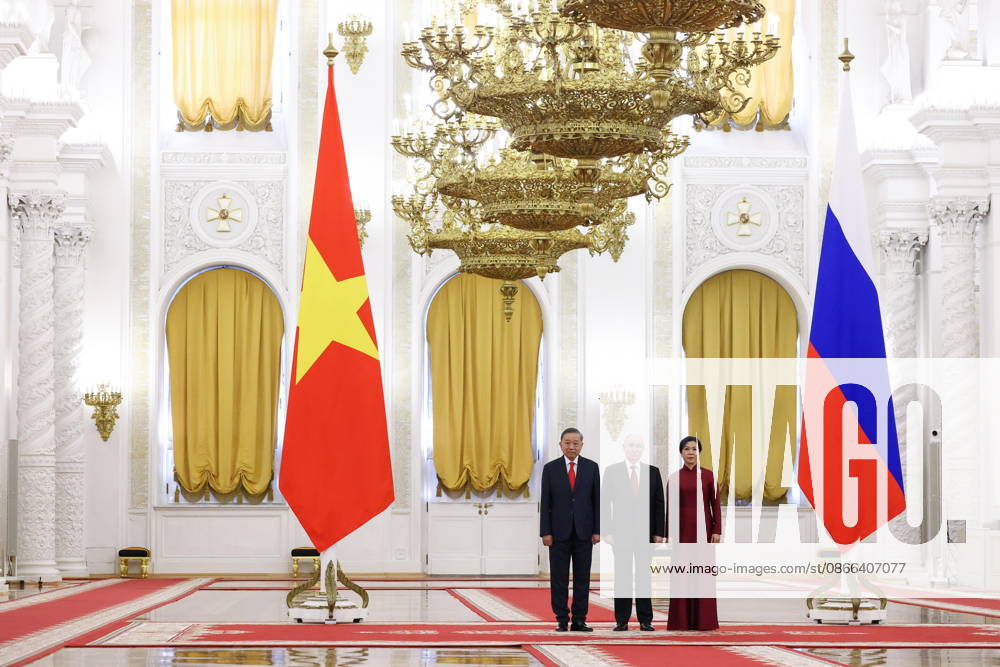 RUSSIA, MOSCOW - SEPTEMBER 9, 2026: Vladimir Putin (C), President of Russia, poses with To Lam (L), President of Vietnam, and his wife Ngo Phuong Ly during a meeting at the Moscow Kremlin Moscow Russia - ZUMAt113 20260909_zaa_t113_127