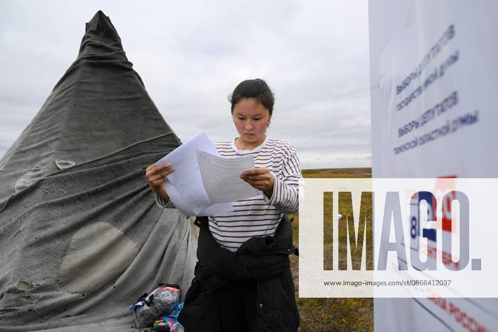 Russia Parliamentary Election Early Voting 9239429 09.09.2026 A member of a local indigenous community reads a ballot during the early voting in remote areas ahead of State Duma elections at a reindeer camping ground, in Yamalo-Nenets Autonomous Area, Russia. Russians will vote in State Duma, the lower house of parliament, and municipal elections over three days, from September 18-20. Alexandr Kryazhev Sputnik Yamalo-Nenets Autonomous Area Russia