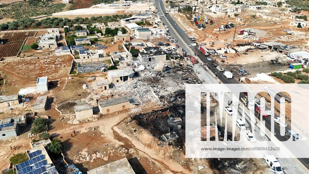 (260909) -- SYRIA, Sept. 9, 2026 -- An aerial drone photo shows a view of the site of an explosion at an ammunition storage site near the city of Sarmada in Syria s northwestern Idlib province, Sept. 9, 2026. At least three people were killed and more than 10 others injured on Wednesday in the explosion, according to preliminary reports. (Str Xinhua) SYRIA-IDLIB-AMMUNITION DEPOT-EXPLOSION Stringer