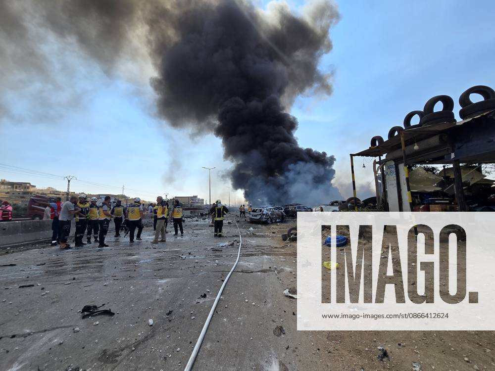 (260909) -- SYRIA, Sept. 9, 2026 -- Smoke billows from the site of an explosion at an ammunition storage site near the city of Sarmada in Syria s northwestern Idlib province, Sept. 9, 2026. At least three people were killed and more than 10 others injured on Wednesday in the explosion, according to preliminary reports. (Str Xinhua) SYRIA-IDLIB-AMMUNITION DEPOT-EXPLOSION Stringer