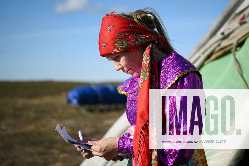 Russia Parliamentary Election Early Voting 9239449 09.09.2026 A member of a local indigenous community reads a ballot during the early voting in remote areas ahead of State Duma elections at a reindeer camping ground, in Yamalo-Nenets Autonomous Area, Russia. Russians will vote in State Duma, the lower house of parliament, and municipal elections over three days, from September 18-20. Alexandr Kryazhev Sputnik Yamalo-Nenets Autonomous Area Russia