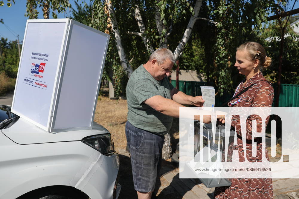 RUSSIA, DONETSK - SEPTEMBER 9, 2026: Citizens participate in early voting in the 2026 State Duma elections at Oktyabrsky. Dmitry Yagodkin TASS 97412810