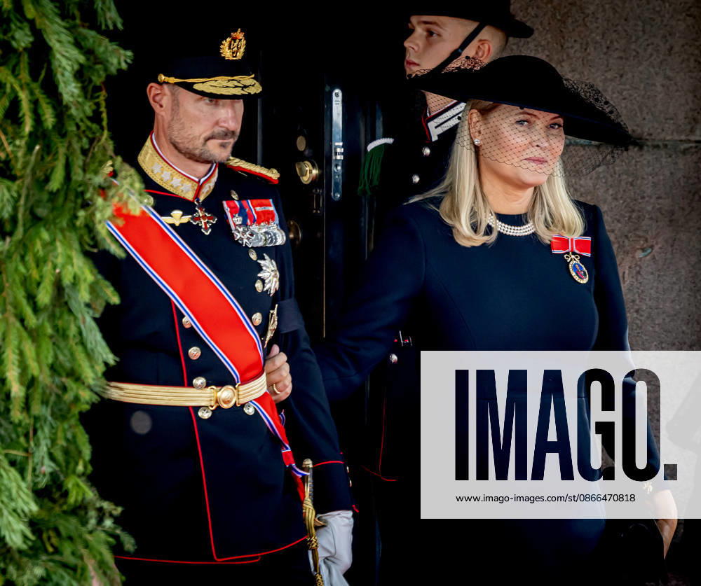 Funeral of King Harald of Norway during a royal procession from the Royal Palace Chapel to the Cathedral in Oslo. King Haakon and Queen Mette Marit Â