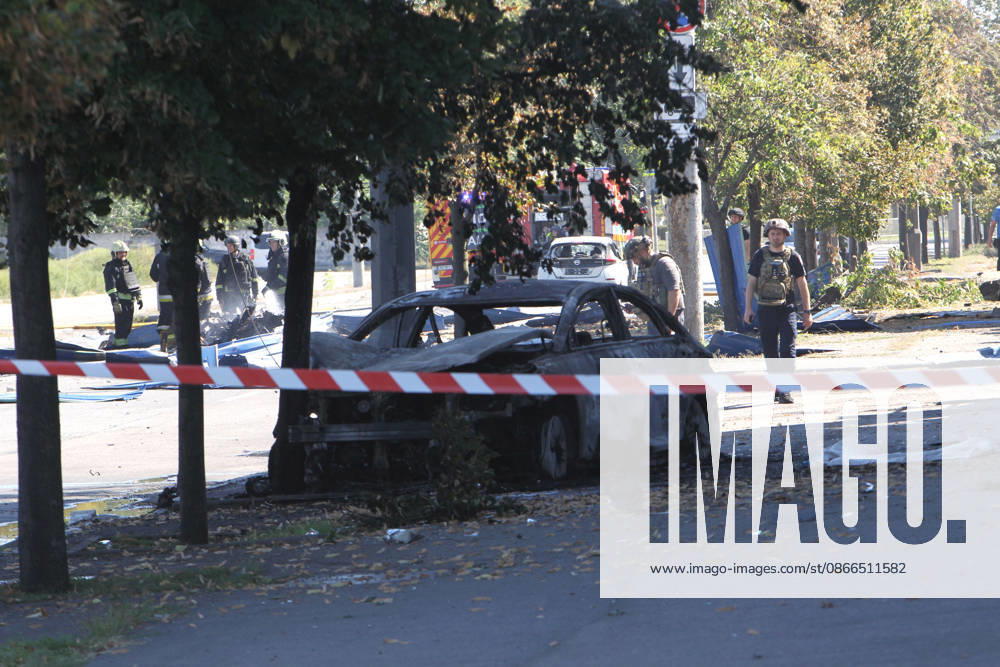 First responders work after a Russian Banderol cruise missile attack, Dnipro, Ukraine, September 10, 2026. Russian forces launched a double strike on the city with S8000 Banderol missiles, damaging a food industry facility. A fire broke out near the site, destroying 12 passenger cars and two minibuses. Two people were killed and at least five injured in the attack. (Photo by Mykola Miakshykov Ukrinform) Aftermath of Russian attack on Dnipro on September 10, 2026