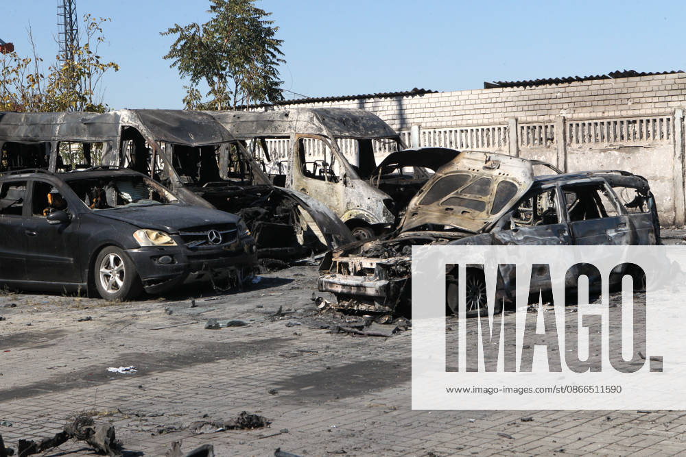 Burnt-out cars are in the street after a Russian Banderol cruise missile attack, Dnipro, Ukraine, September 10, 2026. Russian forces launched a double strike on the city with S8000 Banderol missiles, damaging a food industry facility. A fire broke out near the site, destroying 12 passenger cars and two minibuses. Two people were killed and at least five injured in the attack. (Photo by Mykola Miakshykov Ukrinform) Aftermath of Russian attack on Dnipro on September 10, 2026