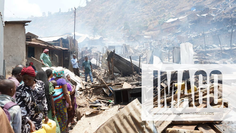 (260910) -- BUKAVU, Sept. 10, 2026 -- People gather at a fire site in Bukavu, Democratic Republic of the Congo, Sept. 10, 2026. At least 21 students were killed and several others seriously injured in a fire that broke out Thursday in Bukavu, capital of the eastern Democratic Republic of the Congo (DRC) s South Kivu Province, local media reported. (SpotNews) DR CONGO-BUKAVU-FIRE-AFTERMATH XinxHuashe