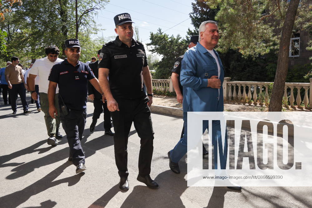 ARMENIA, YEREVAN - SEPTEMBER 11, 2026: Samvel Karapetyan (R), leader of the Strong Armenia Party, is escorted by police officers near the Anti-Ñorruption Court building. Alexander Patrin TASS 97520401