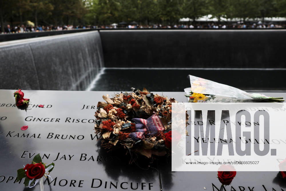 Lowers are left at the memorial during a remembrance ceremony marking the 25th anniversary of the 9 11 attacks at the National September 11 Memorial & Museum at Ground Zero in New York on Friday, September 11, 2026. A total of 2,753 people died in the attack on the World Trade Center on September 11, 2001. Pool WAX20260911965 SpencerxPlatt