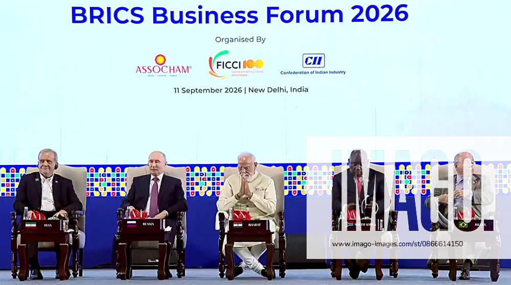 Leaders Session of the BRICS Business Forum New Delhi, Sep 11 (ANI): Prime Minister Narendra Modi greets during the Leaders Session of the BRICS Business Forum, in New Delhi on Friday. Russian President Vladimir Putin, Iranian President Masoud Pezeshkian, South African President Cyril Ramaphosa and Brazilian Foreign Minister Mauro Vieira also present. (DD News ANI Video Grab) New Delhi Delhi India
