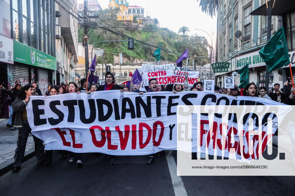 Demonstration march in commemoration of the 53rd anniversary of the coup d Ètat in ValparaÌso, Chile - 9 Sept 2026 Protesters chant slogans and hold a banner expressing their opinion during a demonstration march commemorating the 53rd anniversary of the coup d Ètat in ValparaÌso. Valparaiso Chile