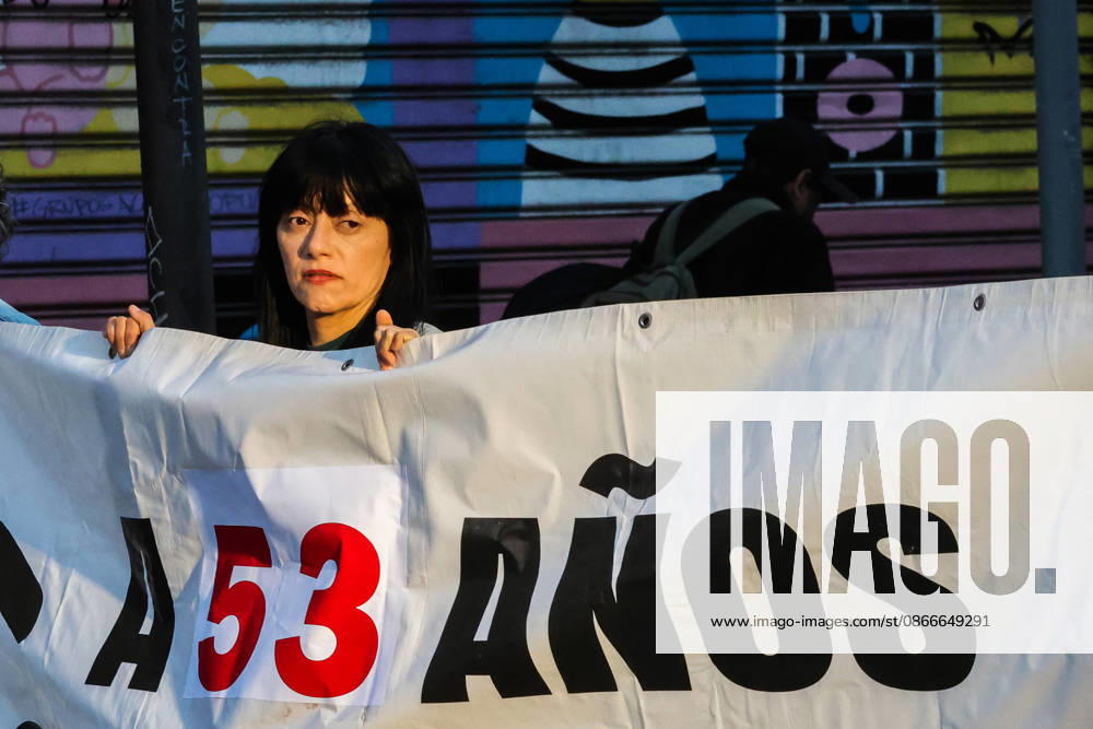 Demonstration march in commemoration of the 53rd anniversary of the coup d Ètat in ValparaÌso, Chile - 9 Sept 2026 A protester holds a banner expressing her opinion during a demonstration march commemorating the 53rd anniversary of the coup d Ètat in ValparaÌso. Valparaiso Chile