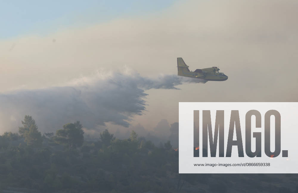 Croatia Island Wildfire A Croatian Canadair CL-415 firefighting plane drops water on a wildfire near city Milna at Island Brac, Croatia on September 12, 2026. IvoxCagalj PIXSELL
