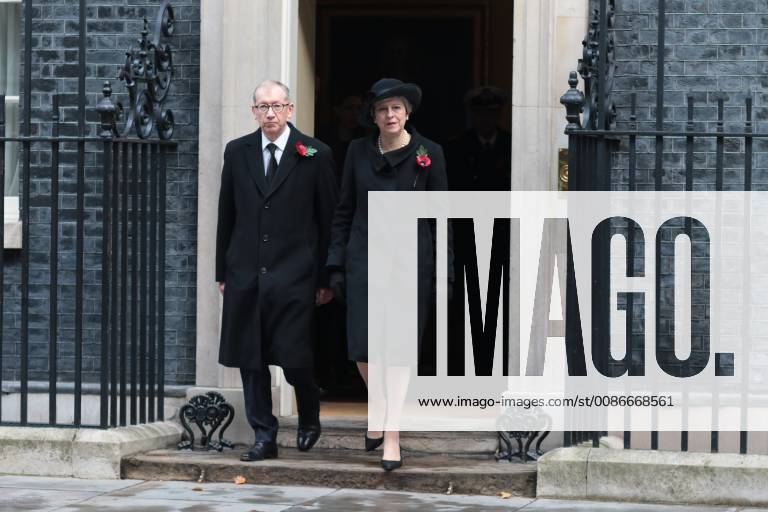 Prime Minister Theresa May and husband Philip leave Downing Street on the way to the Remembrance Sunday ceremony at the Cenotaph in Whitehall. Today marks 100 years since the end of the First World War. Remembrance Sunday, London, on November 11, 2018.