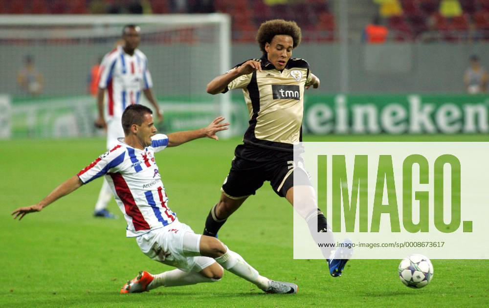 Bucharest(Romania) FC Otelul Galati-SL Benfica Champions League Group C men s football Axel Witsel(R) SL Benfica and Zoran Ljubinkovic(L) FC Otelul Galati :