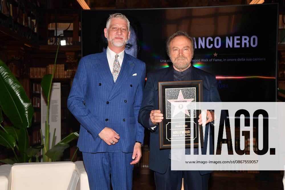 IPA88844569 - Rome, Ministry of Culture: Ceremony to Award Franco Nero the Stella Award. Pictured: Alessandro Giuli and Franco Nero
