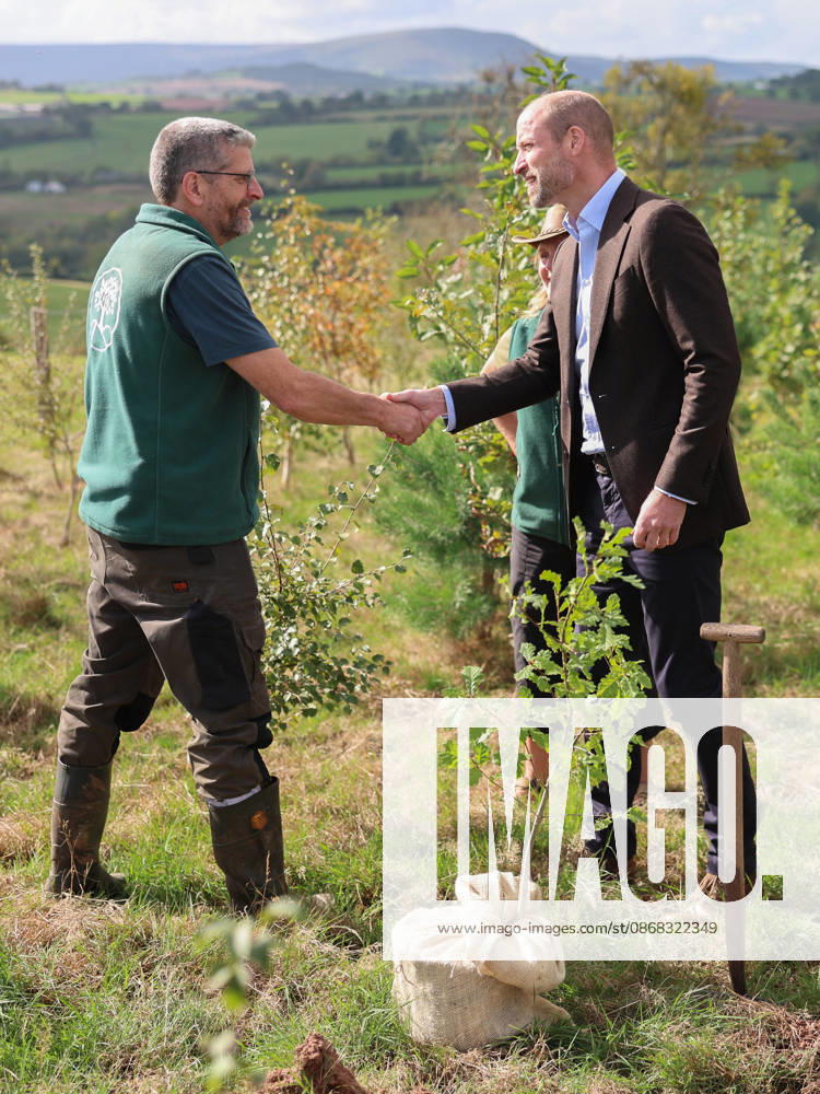 The Prince Of Wales Visits Monmouthshire And Herefordshire ABERGAVENNY, WALES - OCTOBER 01: Prince William, Prince Of Wales (R) shakes hands as he joins volunteers participating in a seed collection activity and hears about the progress towards the goal of planting one million trees during his visit to charity Stump Up For Trees, which aims to plant native trees across South Wales, at White Castle Farm on October 01, 2026 in Abergavenny, Wales. The Prince of Wales visited the region to meet with those tackling the threat of flooding caused by extreme weather conditions., Credit:Chris Jackson PA ROTA - B68 Avalon United Kingdom, Wales, Abergavenny