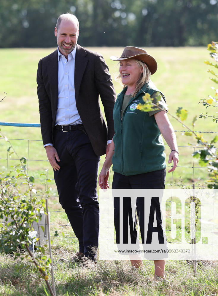 The Prince Of Wales Visits Monmouthshire And Herefordshire ABERGAVENNY, WALES - OCTOBER 01: Prince William, Prince Of Wales laughs with Kate Beavan from Great Tre-rhew Farm, a local farming family, who have partnered with the charity Stump Up For Trees, to use their land for upstream flooding interventions and the charity s goal of planting one million native trees across South Wales, at White Castle Farm on October 01, 2026 in Abergavenny, Wales. The Prince of Wales visited the region to meet with those tackling the threat of flooding caused by extreme weather conditions., Credit:Chris Jackson PA ROTA - B68 Avalon United Kingdom, Wales, Abergavenny