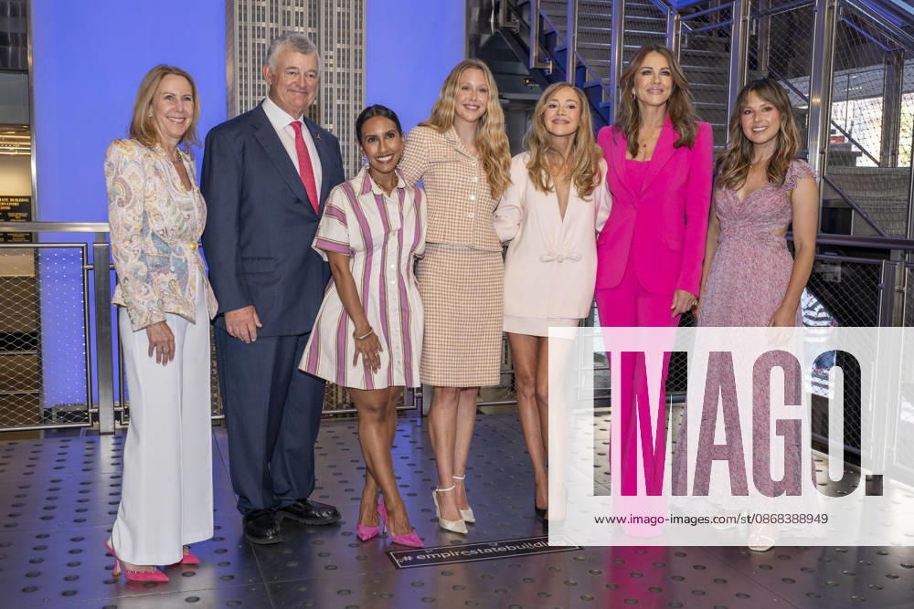 DONNA MCKAY, WILLIAM P. LAUDER, SADIA ZAPP, MIRANDA MCKEON, BRIDGET BAHL, ELIZABETH HURLEY and KATIE THURSTON visit the Empire State Building in New York to honor Breast Cancer Awareness Month and the Breast Cancer Campaign with The Estee Lauder Company. 1 October 2026 New York USA - ZUMAa265 20261001_zep_a265_037