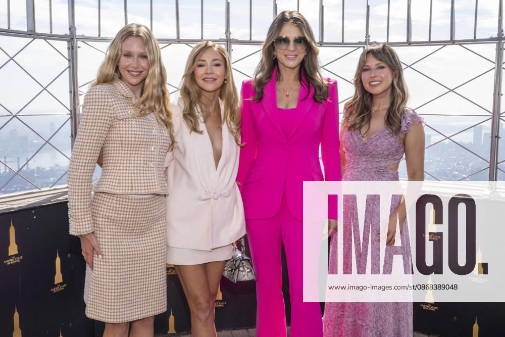 MIRANDA MCKEON, BRIDGET BAHL, ELIZABETH HURLEY and KATIE THURSTON visit the Empire State Building in New York to honor Breast Cancer Awareness Month and the Breast Cancer Campaign with The Estee Lauder Company. 1 October 2026 New York USA - ZUMAa265 20261001_zep_a265_050