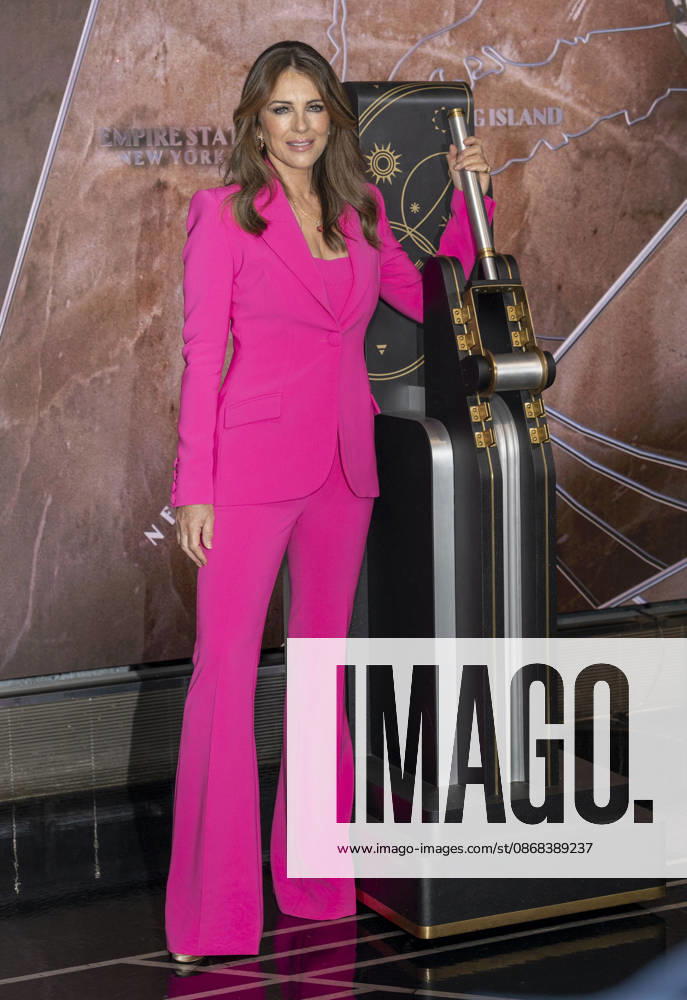 ELIZABETH HURLEY visits the Empire State Building in New York to honor Breast Cancer Awareness Month and the Breast Cancer Campaign with The Estee Lauder Company. 1 October 2026 New York USA - ZUMAa265 20261001_zep_a265_018