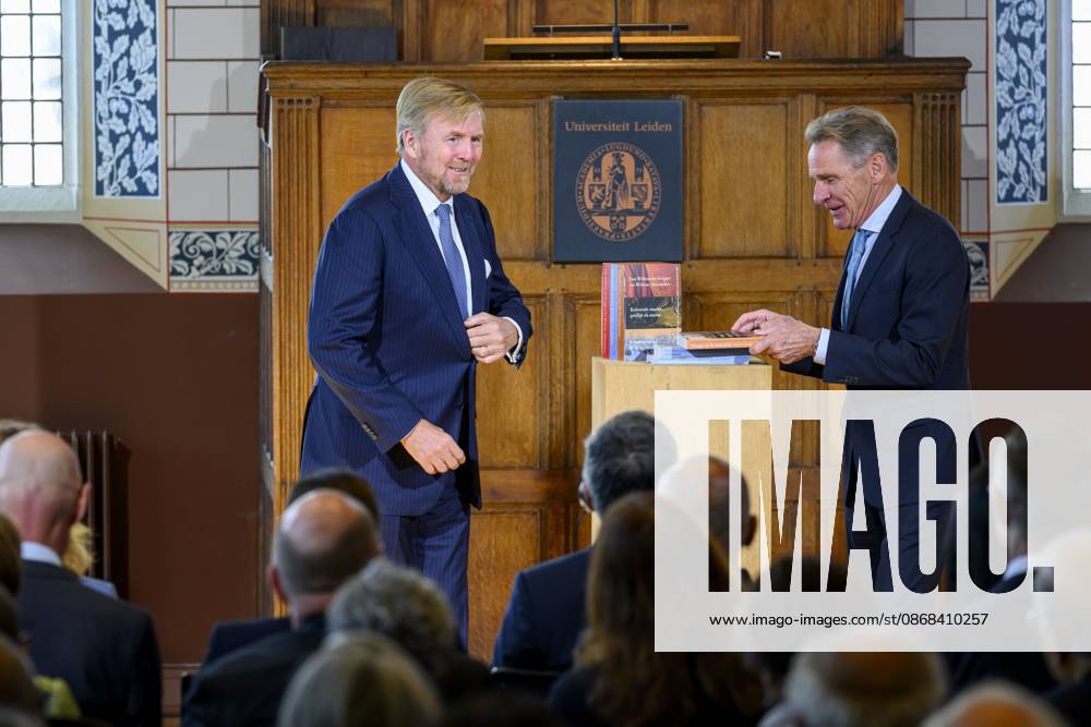 Leiden, The Netherlands, 2026-10-02 11:59:27 LEIDEN, 02-10-2026, Leiden University. King Willem Alexander receives the results of the independent research into the role of the House of Orange-Nassau in the colonial history of the Netherlands in the Academy Building of Leiden University. Principal investigator Prof. Dr. Gert Oostindie presents the King with the five books on which approximately sixty researchers have worked over the past few years, including the comprehensive popular book *Oranje en de Koloniën, 1600-2025. De kolonie geschiedenis van het Huis Oranje-Nassau*. PHOTO: NLBeeld Patrick van Emst Credit: NL Beeld Patrick van Emst