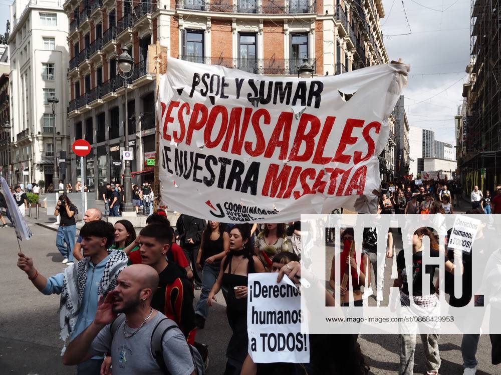 MADRID, SPAIN - October 02: In a vote, the Congress of Deputies in Madrid rejected the two decrees of housing measures in Spain, one of which would prevent evictions such as Maricarmen s. The demonstrators who were outside the Congress of Deputies, following, watching and listening to the vote on their cell phones, marched after the vote to the encampment in Puerta del Sol, announcing that they will take measures and that they will not be removed from the site. Madrid Spain - ZUMAh199 20261002_zip_h199_008