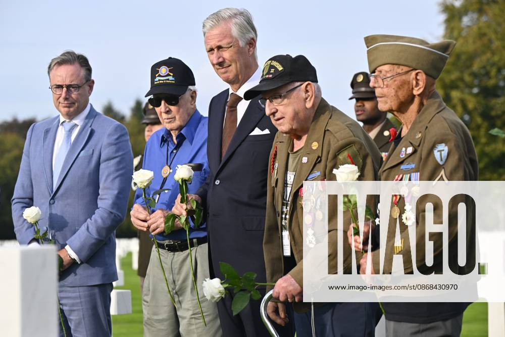 Prime Minister Bart De Wever and King Philippe - Filip of Belgium are pictured with war veterans during a royal visit to the World War II Commemoration at the American Military Cemetery in Henri-Chapelle, Plombieres, on Friday 2 October 2026. The ceremony pays tribute to the American veterans in attendance and to their fallen comrades-in-arms. It features testimonials, musical performances, and prayers, as well as a wreath-laying ceremony, a salute, and a flyover by U.S. aircraft. ERICxLALMAND 188545471