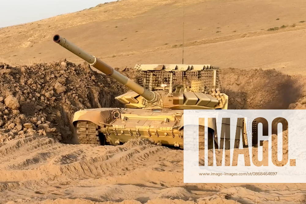 Russian tank crews destroy a simulated enemy during the Tsentr Centre 2026 military exercise held at the Lyaur training ground. Video screen grab. Best quality available. Russian Defence Ministry TASS 98708959
