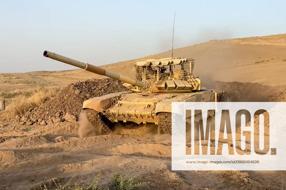 Russian tank crews destroy a simulated enemy during the Tsentr Centre 2026 military exercise held at the Lyaur training ground. Video screen grab. Best quality available. Russian Defence Ministry TASS 98708961