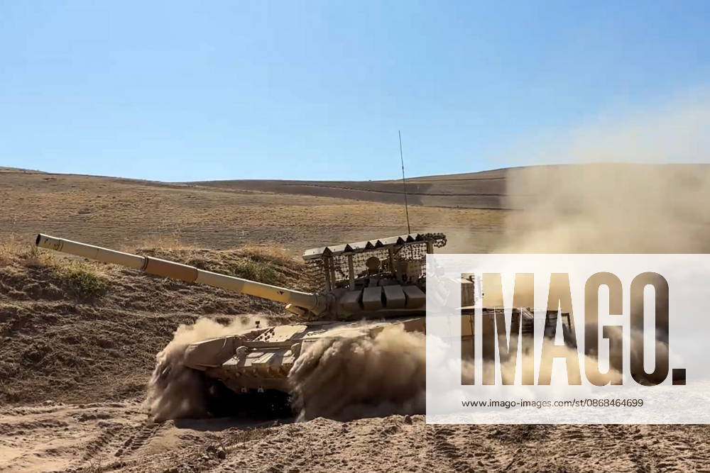 Russian tank crews destroy a simulated enemy during the Tsentr Centre 2026 military exercise held at the Lyaur training ground. Video screen grab. Best quality available. Russian Defence Ministry TASS 98708964