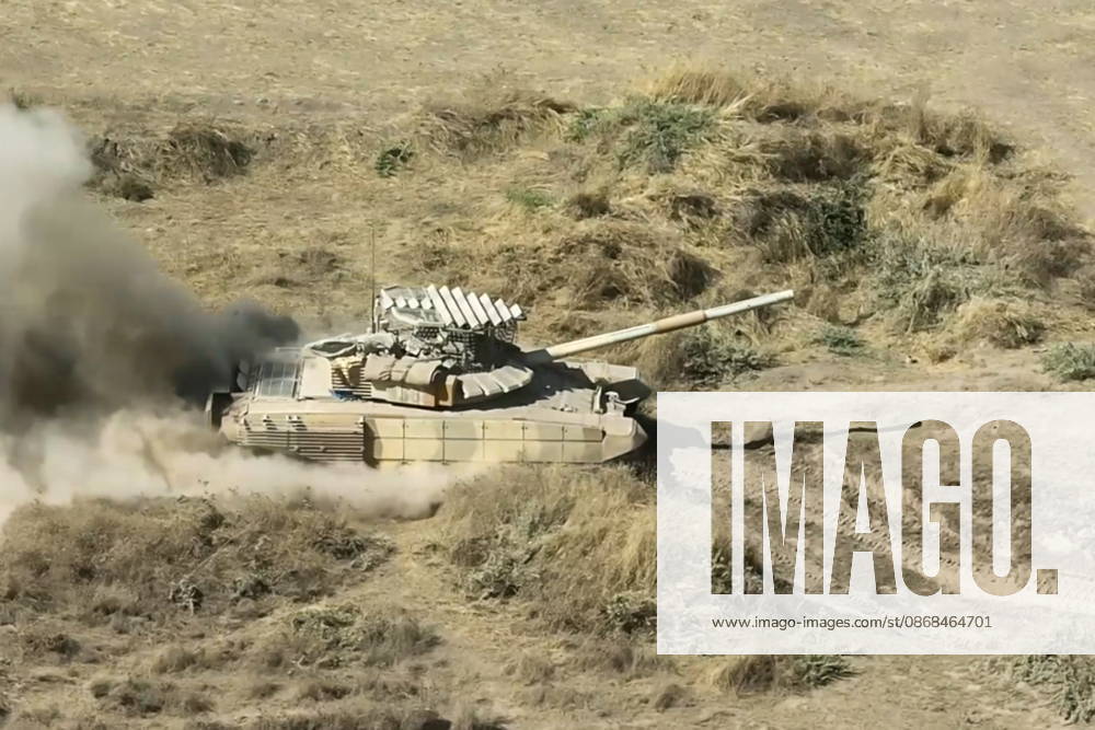 Russian tank crews destroy a simulated enemy during the Tsentr Centre 2026 military exercise held at the Lyaur training ground. Video screen grab. Best quality available. Russian Defence Ministry TASS 98708968