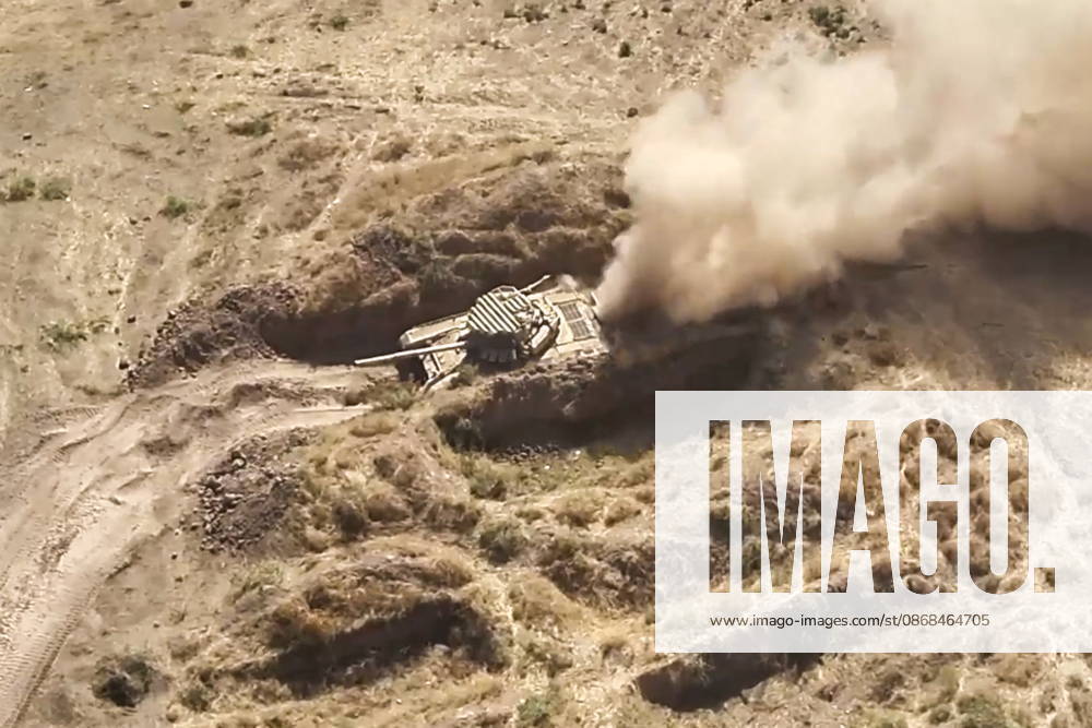 Russian tank crews destroy a simulated enemy during the Tsentr Centre 2026 military exercise held at the Lyaur training ground. Video screen grab. Best quality available. Russian Defence Ministry TASS 98708970