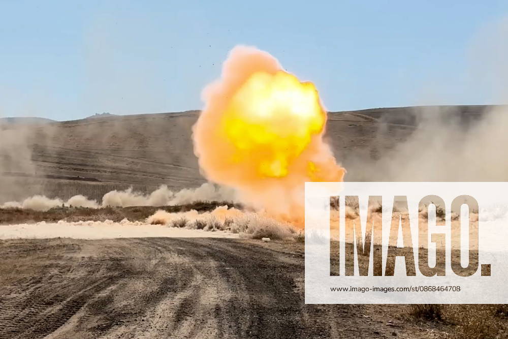 Russian tank crews destroy a simulated enemy during the Tsentr Centre 2026 military exercise held at the Lyaur training ground. Video screen grab. Best quality available. Russian Defence Ministry TASS 98708971