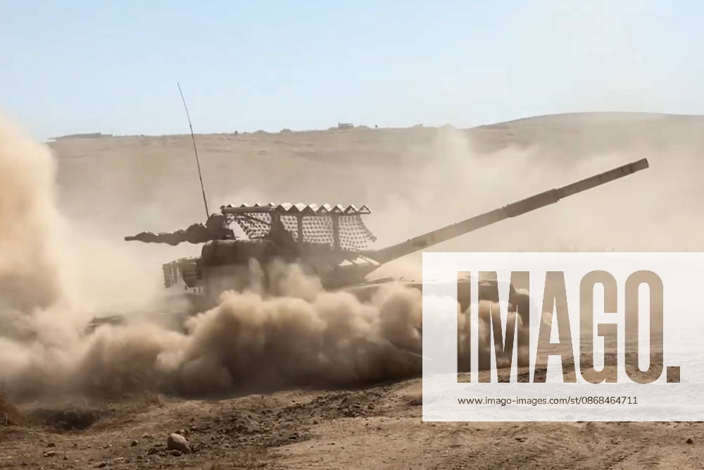Russian tank crews destroy a simulated enemy during the Tsentr Centre 2026 military exercise held at the Lyaur training ground. Video screen grab. Best quality available. Russian Defence Ministry TASS 98708974