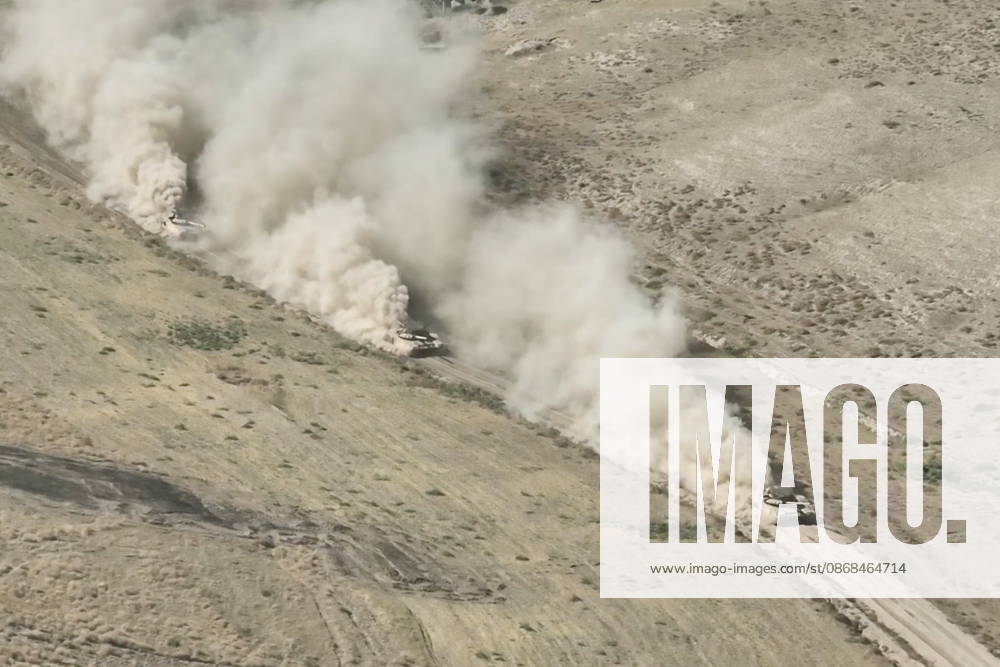 Russian tank crews destroy a simulated enemy during the Tsentr Centre 2026 military exercise held at the Lyaur training ground. Video screen grab. Best quality available. Russian Defence Ministry TASS 98708975