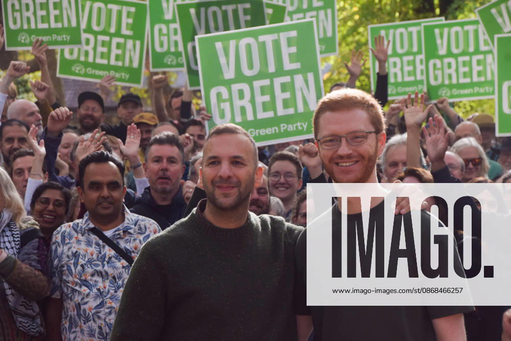 Green Party leader ZACK POLANSKI and co-leader of the Scottish Green Party ROSS GREER stand with supporters in St Pancras Gardens as Zack Polanski continues his campaign ahead of the upcoming Holborn and St Pancras by-election. London United Kingdom - ZUMAv130 20261003_zip_v130_006