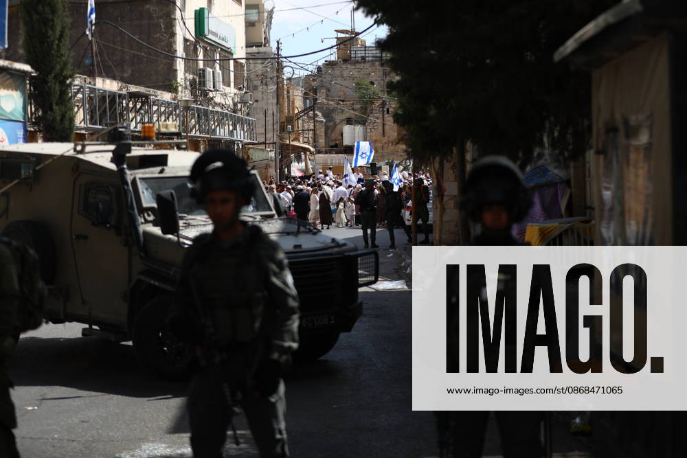Israeli Soldiers Restrict Palestinian Movement During Settler Tour in Hebron Israeli soldiers restrict the movement of Palestinians and take security measures during a tour by Israeli settlers in the Old City of Hebron, in the West Bank, on October 3, 2026, during the Jewish holiday of Sukkot. Photo by Mamoun Wazwaz apaimages Hebron West Bank Palestinian Territory 031026_Hebron_MW_00(27)