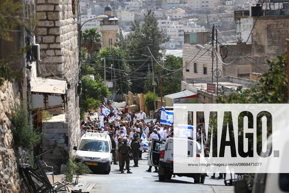 Israeli Soldiers Restrict Palestinian Movement During Settler Tour in Hebron Israeli soldiers restrict the movement of Palestinians and take security measures during a tour by Israeli settlers in the Old City of Hebron, in the West Bank, on October 3, 2026, during the Jewish holiday of Sukkot. Photo by Mamoun Wazwaz apaimages Hebron West Bank Palestinian Territory 031026_Hebron_MW_00(9)