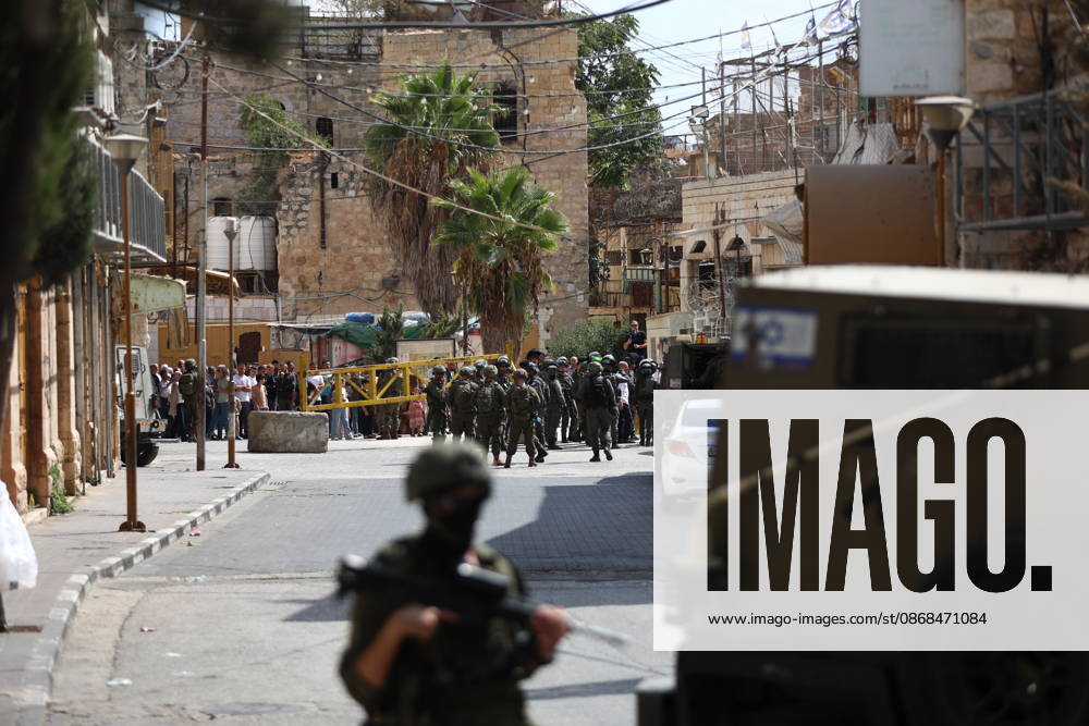Israeli Soldiers Restrict Palestinian Movement During Settler Tour in Hebron Israeli soldiers restrict the movement of Palestinians and take security measures during a tour by Israeli settlers in the Old City of Hebron, in the West Bank, on October 3, 2026, during the Jewish holiday of Sukkot. Photo by Mamoun Wazwaz apaimages Hebron West Bank Palestinian Territory 031026_Hebron_MW_00(49)