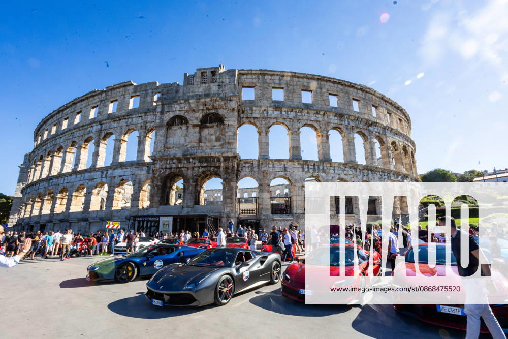 Ferrari Tour stops in Pula Luxury Ferrari sports cars taking part in a Ferrari Tour organized by Ineco Auto, are seen in front of the Roman Arena in Pula, Croatia, on October 3, 2026. While the drivers visit the ancient amphitheatre, local residents gather to watch and admire the vehicles. SreckoxNiketic PIXSELL