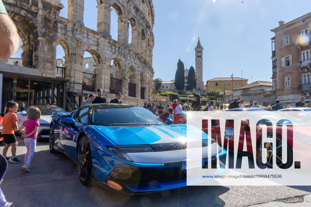 Ferrari Tour stops in Pula Luxury Ferrari sports cars taking part in a Ferrari Tour organized by Ineco Auto, are seen in front of the Roman Arena in Pula, Croatia, on October 3, 2026. While the drivers visit the ancient amphitheatre, local residents gather to watch and admire the vehicles. SreckoxNiketic PIXSELL