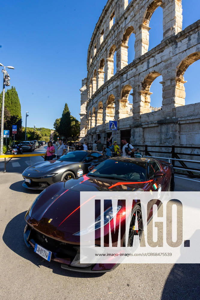 Ferrari Tour stops in Pula Luxury Ferrari sports cars taking part in a Ferrari Tour organized by Ineco Auto, are seen in front of the Roman Arena in Pula, Croatia, on October 3, 2026. While the drivers visit the ancient amphitheatre, local residents gather to watch and admire the vehicles. SreckoxNiketic PIXSELL