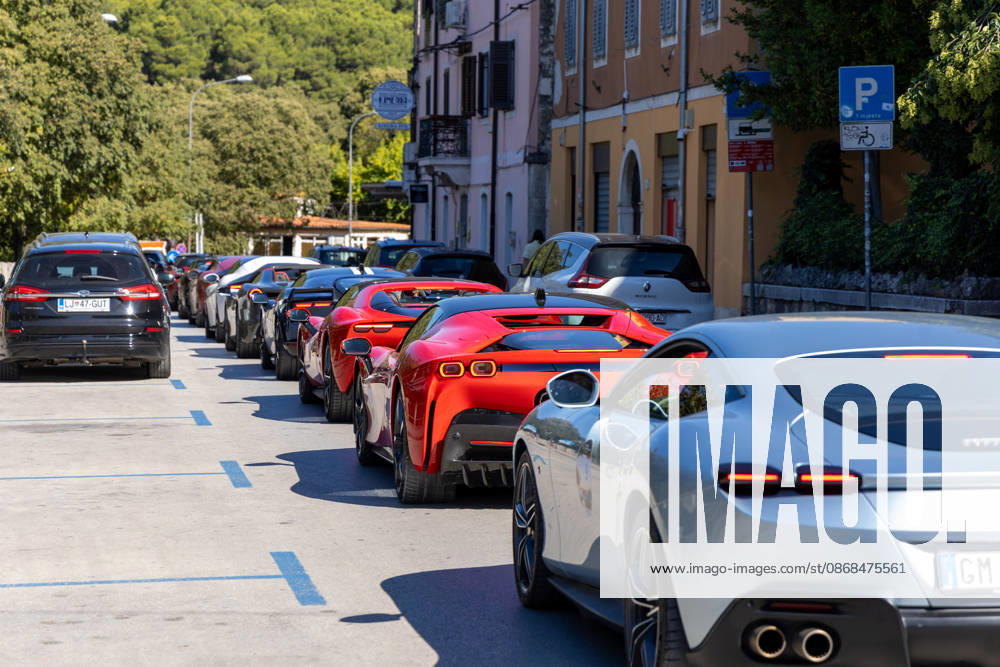 Ferrari Tour stops in Pula Luxury Ferrari sports cars taking part in a Ferrari Tour organized by Ineco Auto, are seen in front of the Roman Arena in Pula, Croatia, on October 3, 2026. While the drivers visit the ancient amphitheatre, local residents gather to watch and admire the vehicles. SreckoxNiketic PIXSELL