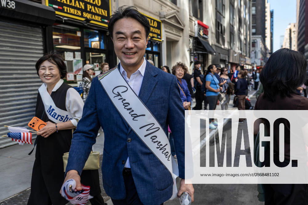 A grand marshall for the 2026 NYC Korean Parade walks by. New York USA - ZUMAh214 20261003_znp_h214_003