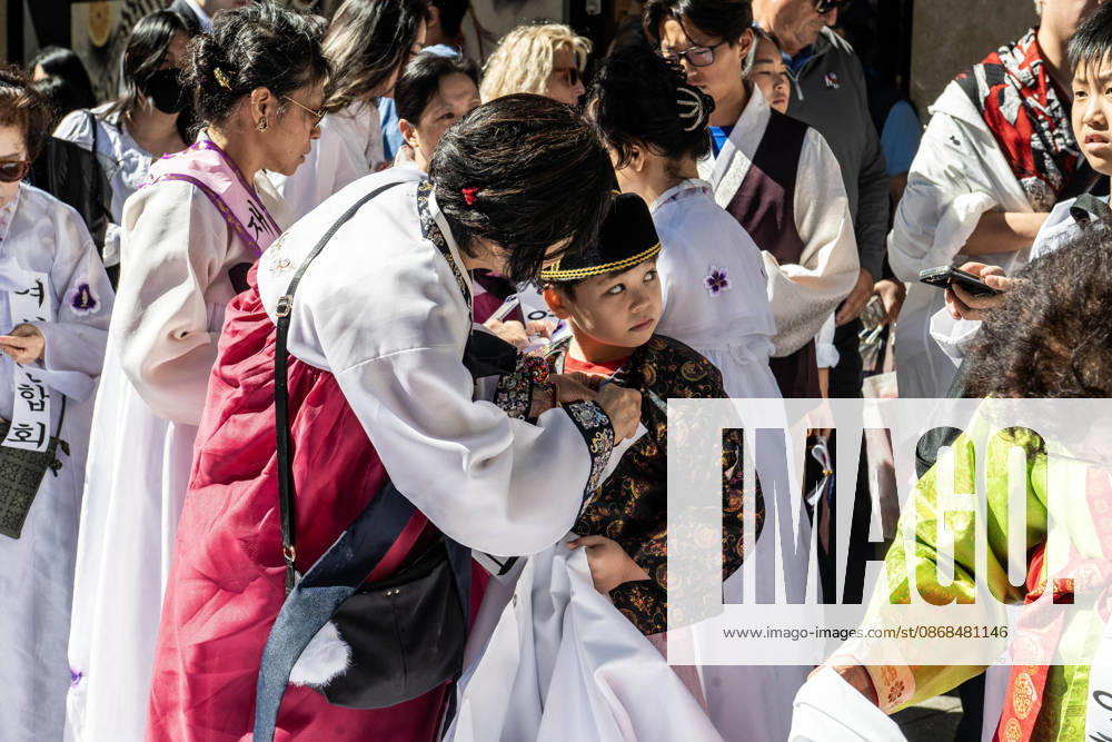 2026 NYC Korean Parade participants get their flags and outfits ready before it starts. New York USA - ZUMAh214 20261003_znp_h214_006