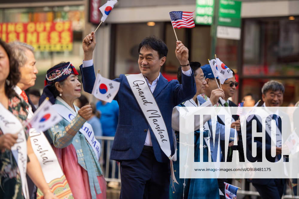 Grand marshals of the 2026 NYC Korean Parade marching at the start of the parade. New York USA - ZUMAh214 20261003_znp_h214_029