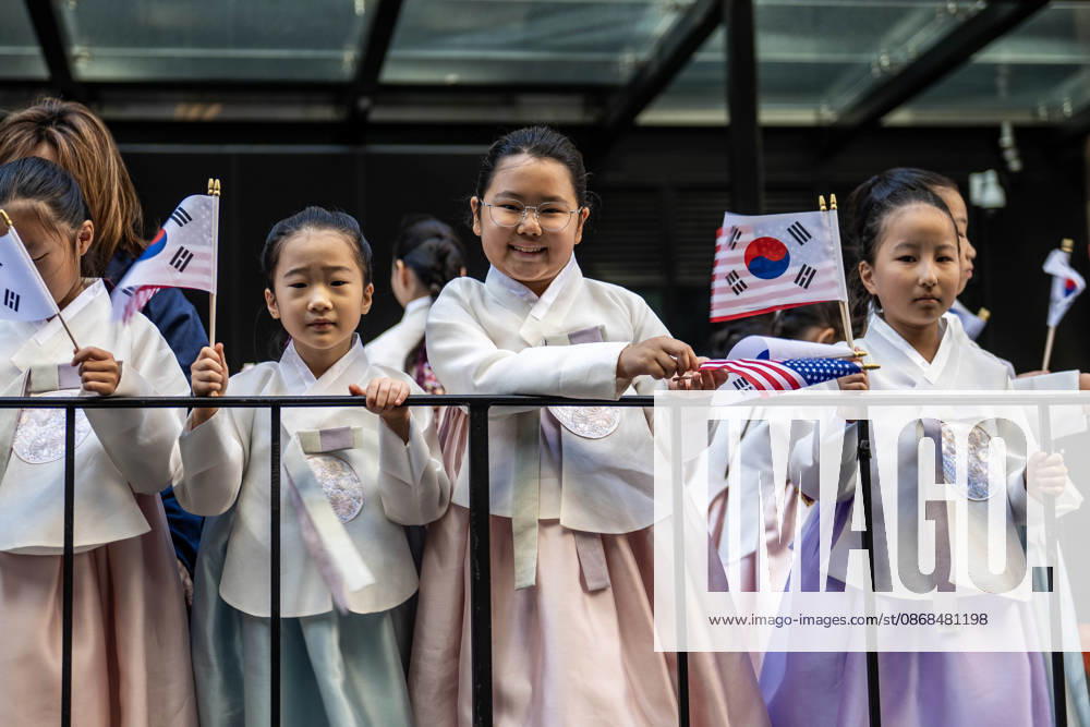 2026 NYC Korean parade participants pose for a photo on their float. New York USA - ZUMAh214 20261003_znp_h214_017