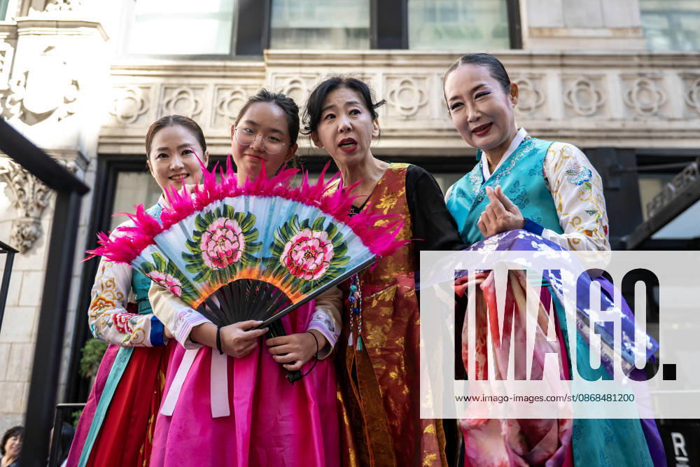 2026 NYC Korean parade participants pose for a photo on their float. New York USA - ZUMAh214 20261003_znp_h214_018