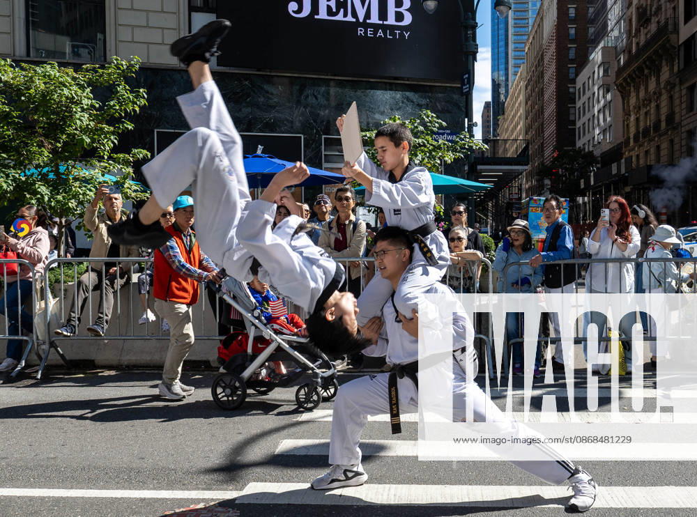 Participants at the 2026 NYC Korean Parade perform karate moves for spectators. New York USA - ZUMAh214 20261003_znp_h214_021